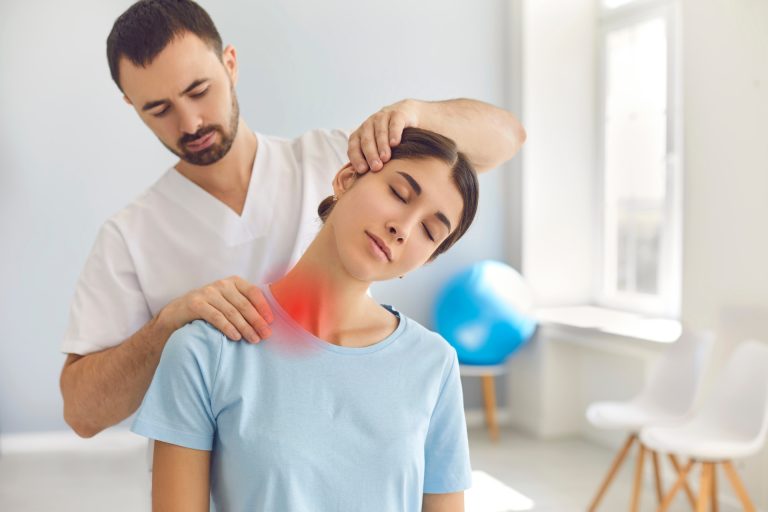 Image of Physiotherapist giving physiotherapy Shoulder massage session to patient