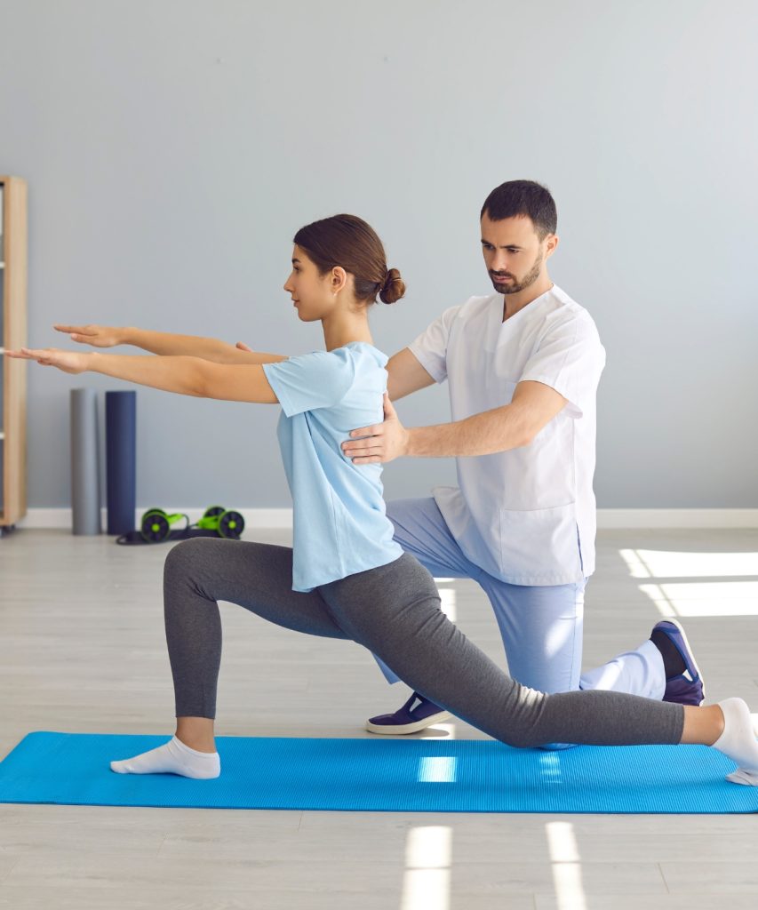 Image of Physiotherapist helping patient for physiotherapy treatment