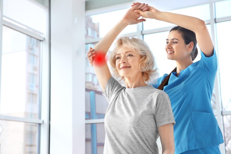 Image of Physiotherapist helping patient to cure elbow pain in physio dundalk